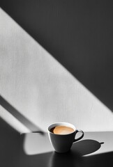 Poster - A cozy coffee cup sits quietly on a flat surface, bathed in gentle morning light. Shadows stretch playfully, creating a serene and minimalist atmosphere that invites calm reflection