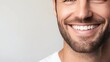 © SETSU ST - Smiling man with a beard and bright blue eyes against a light background
