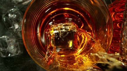 Fototapete - Super Slow Motion of Falling Ice Cube into Cola Drink. Filmed on High Speed Cinema Camera, 1000 fps, Camera Tracking the Target. 