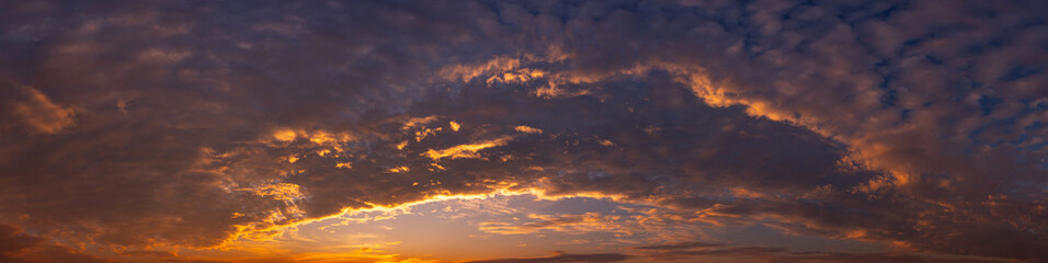 Wall Mural - panorama sunlight with dramatic sky on dark background.vivid sky on dark cloud.