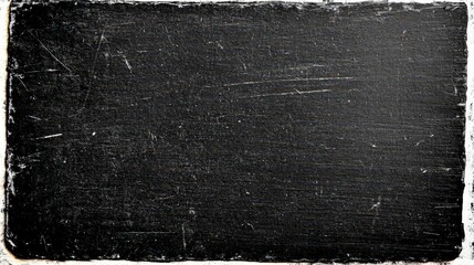Poster - A textured, dark surface with scratches and a slightly weathered appearance, evoking a sense of age and character.