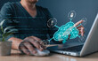 © death_rip - professional uses a laptop with a holographic cloud computing, symbol cloud technology, digital transformation, data management, cybersecurity, and system efficiency in modern tech solutions.