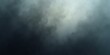 © Syed Sazib - Dark blue fog and clouds create an abstract, stormy night sky texture