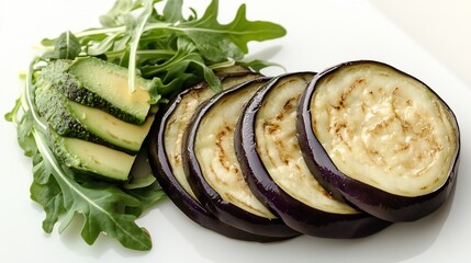 Poster - Grilled eggplant slices with avocado and arugula on a white plate.
