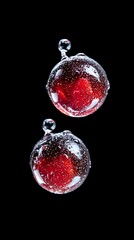 Poster - Red liquid spheres with tiny bubbles floating against black background, macro photography showing surface tension and light reflection in water drops.