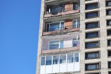 Poster - A tall building with a clock on its side, often used in cityscape or architecture scenes.