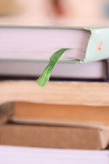 Poster - A book with a bookmark sticking out of the cover.