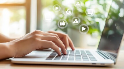 Poster - Close-Up of Person's Hands Typing on Laptop with Content Marketing Icons in Soft Lighting