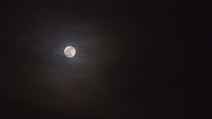 Wall Mural - Bright full moon in the misty and cloudy night sky