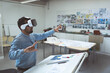 © Wavebreak Media - Man using VR headset in office, interacting with virtual design project, copy space
