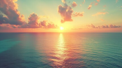 Wall Mural - Ocean horizon under a pastel sky during sunset, clouds with light reflection