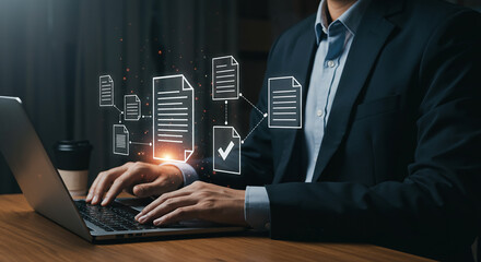 Wall Mural - man in suit typing on laptop with document icons floating above keyboard on wooden table surface