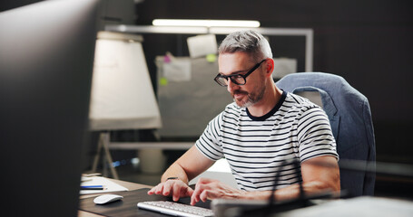 Aufkleber - Business, man and typing on computer in office for creative project, email feedback and online research. Mature person, graphic designer or software app for website layout or design planning at night