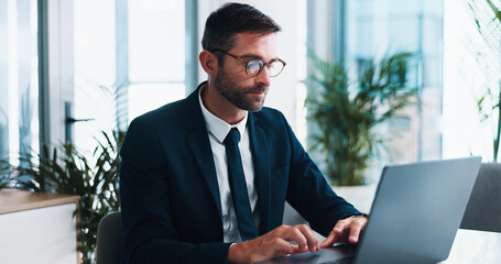 Poster - Businessman, typing and browsing with laptop for financial report, review or corporate statistics. Male person, accountant or office with computer for company finance, budget or planning at workplace