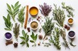 © Tas - A flat lay composition of various herbs, spices, and small bottles.