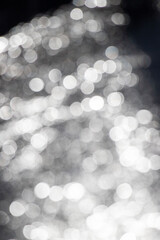 Wall Mural - the image is a blurry, white background with many small