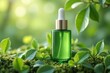 © RESTY - A green glass dropper bottle sits among fresh green leaves