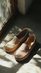 Poster - A pair of shoes sitting on a floor next to a window