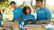 © FremeFlex/peopleimages.com - People, volunteer and boxes of charity at park for giving food, packing supplies and community aid. Staff, tablet and sorting products with donation outreach, teamwork and distribution of NGO welfare