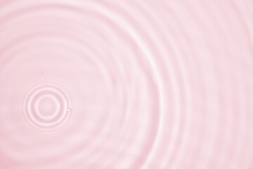 Wall Mural - abstract transparent water shadow surface texture natural ripple on pink background