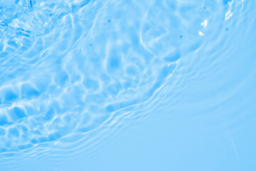 Wall Mural - abstract transparent water shadow surface texture natural ripple on blue background