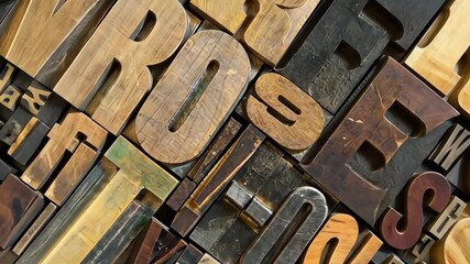 Poster - moving around a background made of retro wooden typeset letters for a printing press