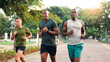 © peopleimages.com - Running, friends and men in park for workout, marathon training and exercise on outdoor path. Sports, fitness and people for performance, endurance and challenge for health, wellness and cardio