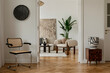 © FollowTheFlow - Elegant home interior with a blend of contemporary and natural materials. Warm neutrals, textured textiles, and sculptural decor.