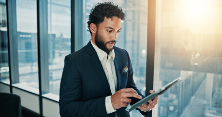 Fototapete - Tablet, email and businessman by window in office for company budget plan with connection. Digital technology, research and male financial manager with investment proposal for profit or revenue.