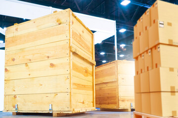 Poster - Wooden boxes in the warehouse. Boxes out of wood for packing industrial machinery. Warehousing. Packaging of finished products of the plant. Sale of packaging materials.