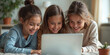 © budistwn - Family of girls smil AIing and looking at a laptop. Generative