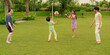 © Raushan_films - Indian happy active family group playing casual foot ball game enjoy outdoor garden park middle aged older dad spend day with cute teen child kids son young adult girl boy have fun joy sports time