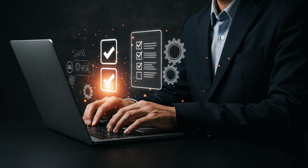 Wall Mural - man in suit typing on laptop with digital checklist and gears overlay on dark background