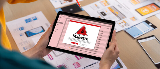 Fototapete - cyber attacking concept. malware alert showing on computer screen display scam and threat detection 