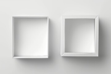 Poster - Two empty white cardboard boxes on a white background, showcasing minimalist packaging.
