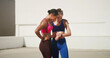 © peopleimages.com - Fitness, friends and women in city with watch for training, exercise and workout outdoors. Sports, personal trainer and people with health tracking, progress app and time for performance and wellness
