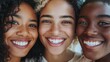 © Ludmila Zabaranilova - Close-up portrait of afro american hipster friends smiling with healthy white teeth satisfied with dentist and whitening, happy dark skinned sister and bother exciting with leisure looking at camera
