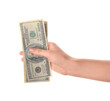 © Pixel-Shot - Female hand holding one hundred dollar banknotes isolated on white background