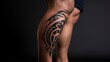 © nuryadin - Tribal Tattoo on a Man's Leg: A Close-Up View