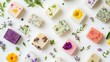 © xoan - Handmade floral soaps arranged on white background