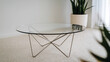 © santana - Modern glass coffee table on beige carpet Clean lines minimalist style