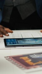 Poster - vertical video factory experts designing assembly facility production lines in tablet cad program. i