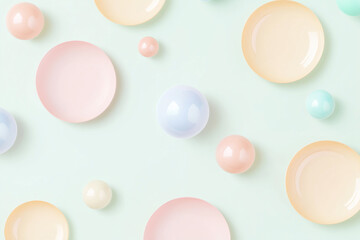Aufkleber - Pastel colored plates and spheres creating a cheerful pattern on light green background