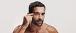 © Jess B/peopleimages.com - Check, wrinkles or portrait of man in studio for skincare glow, face beauty or dermatology. Antiaging cosmetics, mockup space or model on white background for facial treatment, banner or inspection