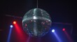 © Roman O - A shimmering disco ball hangs suspended, reflecting colorful lights and creating a vibrant atmosphere perfect for celebrations and nightlife events.