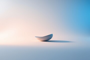 Wall Mural - Minimalist design of a bowl with soft lighting showcasing simplicity and elegance