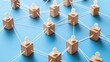 © Achmad Khoeron - Wooden blocks connected together on a blue background. Teamwork concept