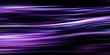 © rajagambar99 - Abstract Purple Light Streaks Flowing Across a Black Background
