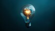 © aishale - A luminous glowing Earth planet inside a lightbulb glass bulb