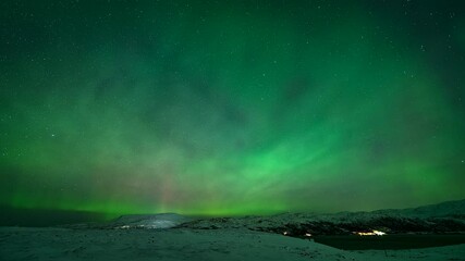 Wall Mural - Dancing Lights Over Colorful Sky With Aurora Borealis Near Kvaloyvaagen, Norway. Timelapse